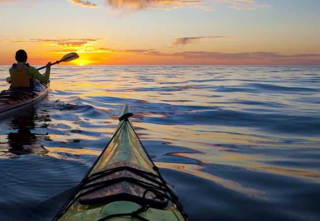 Kayaking into the sunrise on the Sea of Cortez, Baja, Mexico